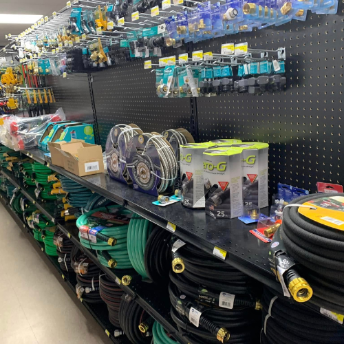 Lawn and garden supplies on display inside of Blakeney Hardware.