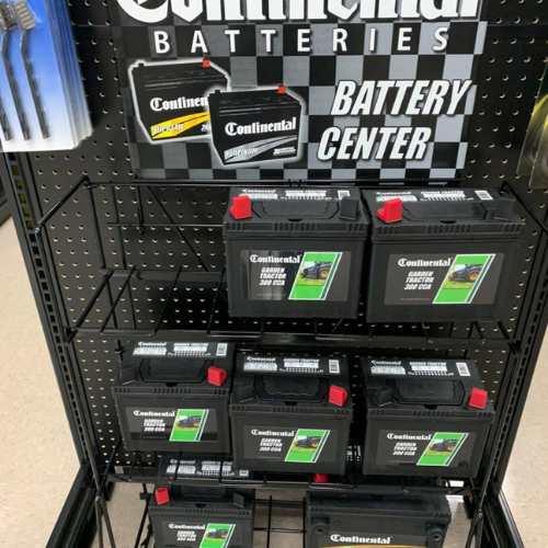 Car batteries on display inside of Blakeney Hardware.