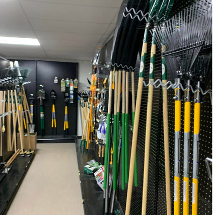 Lawn & Garden ToolsLawn and garden supplies. on display inside of Blakeney Hardware.